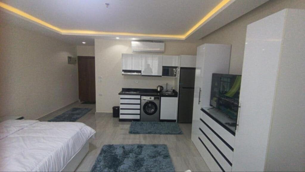 Contemporary studio with partial sea view, compact kitchen, and modern furnishings in Hurghada.