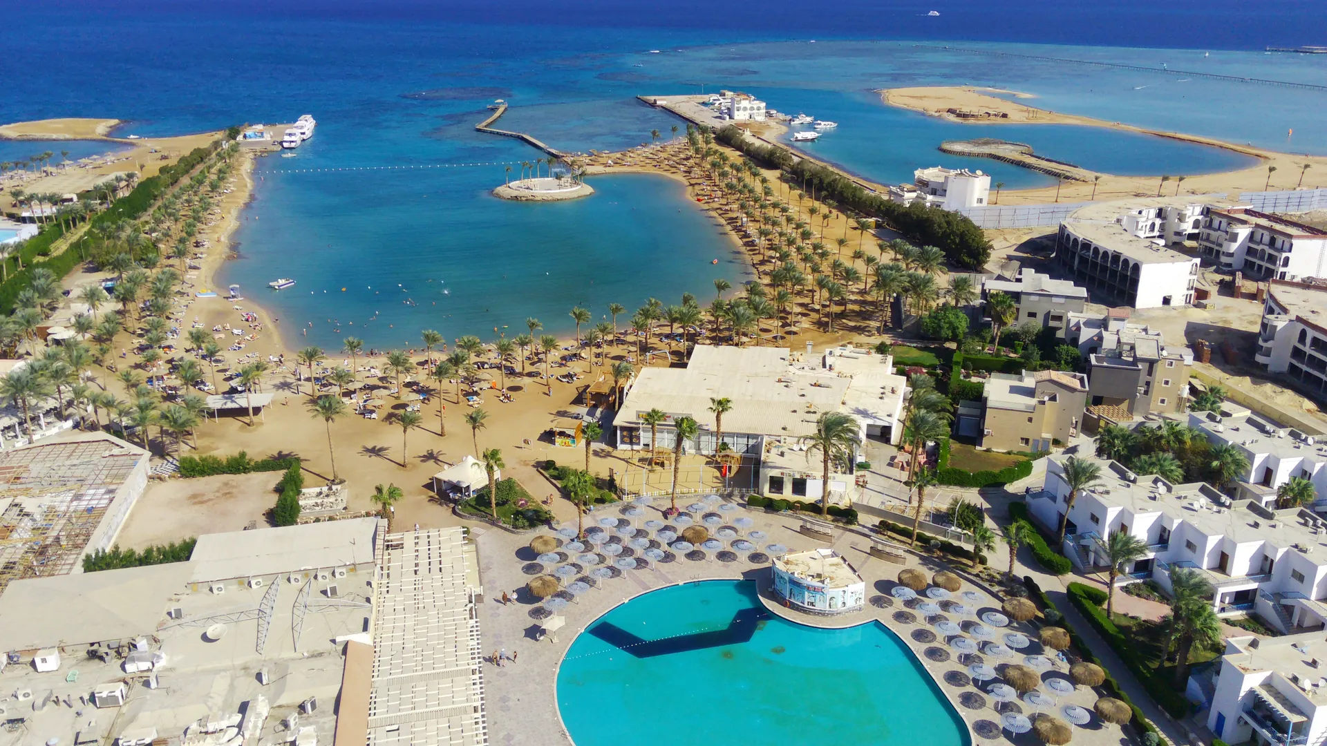 Aerial view of the Mirage resort pool, beach and Red Sea on Touristic Villages Road, Hurghada